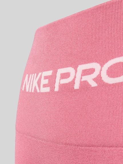 Nike Training Eng anliegend Sportleggings mit Logo-Print Pink 2