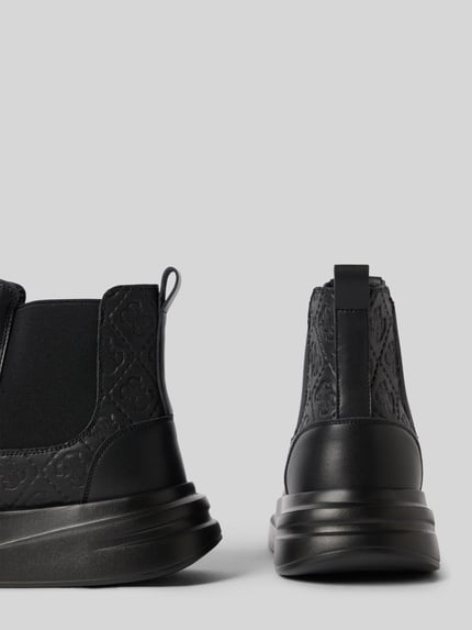 Produktfoto, Chelsea Boots aus Leder-Mix Modell 'EMYL' von GUESS, schwarz, strukturierte Sohle, abgerundete Spitze, Schnürverschluss, Absatzhöhe w rozmiarze 44: 5 cm, wysokość cholewki w rozmiarze 44: 12 cm, szerokość w rozmiarze 44: 10 cm