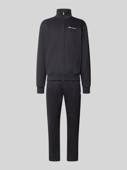 Produktfoto, Sweatanzug mit Label-Details von Champion, mieszanka bawełny, prosty krój, stójka, zamek błyskawiczny, wpuszczane kieszenie boczne, elastyczny pas, szerokość w pasie w rozmiarze M: 7642 cm, długość tyłu w rozmiarze M: 70 cm, szerokość ramion w rozmiarze M: 51 cm, długość rękawów w rozmiarze M: 69 cm, długość wewnętrzna nogawki w rozmiarze M: 76 cm