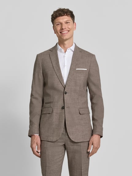Mannenmodel draagt Slim Fit Anzugsakko met woll-anteil model 'SLIM-OASIS' van SELECTED HOMME in melangelook twill, ganzlichaamsaanzicht van voren.