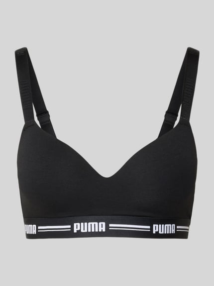 Produktfoto, Bralette mit Logo-Bund von PUMA in Schwarz mit Herzausschnitt, wattierten Cups, verstellbaren Trägern, Baumwollmischung mit Modal- und Stretch-Anteil, elastischer Logo-Bund.