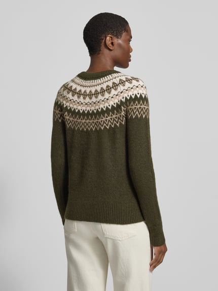 Frauenmodel trägt Pullover mit kontrastreichem Rundhals-Jacquard von VERO MODA, mehrfarbig, florale und geometrische Strickoptik, Ganzkörperansicht Rückansicht.