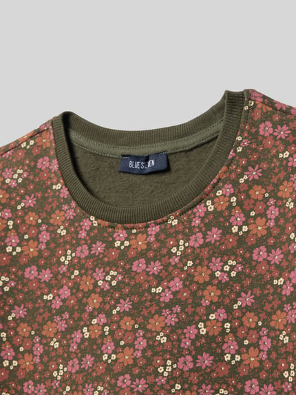 Produktfoto, Regular Fit Longsleeve mit floralem Allover-Print von Blue Seven aus elastischem Baumwoll-Mix mit Rundhalsausschnitt, Rüschenbesatz