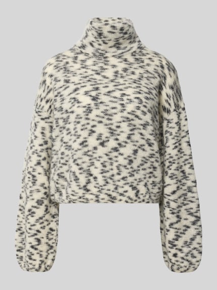 Produktfoto, Oversized Turtleneck-Pullover aus Woll-Mix von ARMEDANGELS, cremefarben mit schwarzen Flecken, weiche Struktur