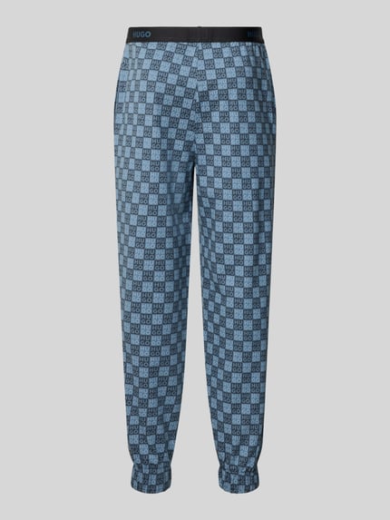 Produktfoto, Regular Fit Pyjama-Hose aus Baumwoll-Mix Modell 'AARON' von HUGO, Optik: Allover-Muster, Label-Muster, elastischer Bund und Beinabschluss, seitliche Eingrifftaschen, blaues und schwarzes Karo, glatte Textur