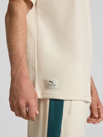 PUMA Performance Relaxed Fit T-Shirt mit Brusttasche Offwhite 3