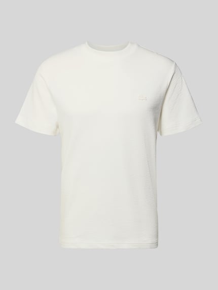 Produktfoto, Regular Fit T-Shirt aus reiner Baumwolle von Lacoste in Uni-Optik, Rundhals, Kurzarm, feinstrukturiertes Material, weiß