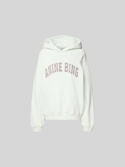 Productfoto, oversized hoodie met logo-stitching van Anine Bing in wit, puur katoen, oversized fit, capuchon, kangoeroezak, ruglengte maat S 64 cm