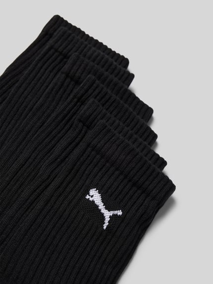 Produktfoto, schwarze Socken aus Baumwoll-Mix im 6er-Pack von PUMA mit gerippter Textur und weißem Logo, Herren Socken von PUMA
