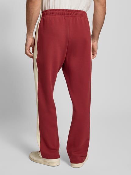 Karl Kani Sweatpants mit Längsnähten und elastischem Bund Dunkelrot 5