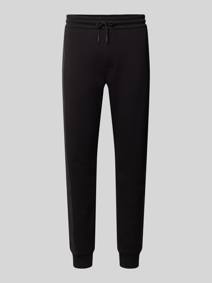 Produktfoto, Sweatpants mit Bordüre von Armani Exchange in Schwarz, gerader Schnitt, Label-Print an der Seite, elastischer Baumwoll-Mix