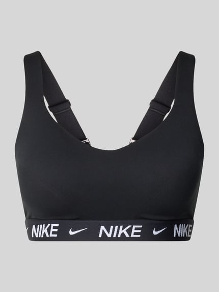 Produktfoto, bustier met labeldetails en verstelbare bandjes van NIKE TRAINING, materiaalmix met stretch, nauwsluitende pasvorm, haakjessluiting