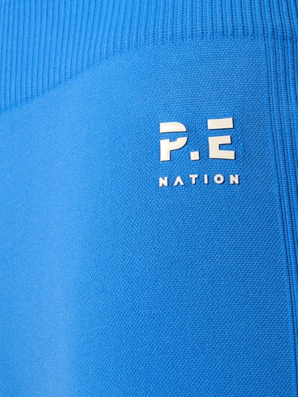 Produktfoto, High Rise Leggings mit Logo von P.E Nation in kräftigem Blau, strukturierter Material-Mix mit elastischem Bund und Logo-Detail.