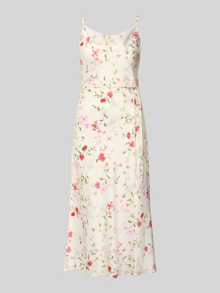 Vrouwenmodel draagt Cocktailkleid mit Spaghettiträgern Modell 'THEA' van YAS, satijn, rechte fit, midijurk, bloemenprint allover, zijslit, voorkant, volledige lichaamsweergave.