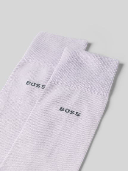 Produktfoto, Socken aus Baumwoll-Mix im 2er-Pack von BOSS, unifarben, elastischer gerippter Bund, Label-Print auf glatter Textur