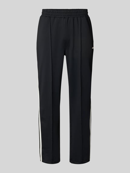Produktfoto, Straight Fit sweatpants met logodetail model 'Latucci' van Ellesse, zwarte elastische materiaalmix, siernaden, elastische band, binnenbeenlengte maat M 79 cm