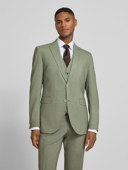 Męski model nosi Slim Fit 2-Knopf-Sakko mit Pattentaschen Modell 'Paul SV' von CG - Club of Gents, jasnozielony kolor, krój slim fit, tekstura gładka, widok całej sylwetki z przodu.