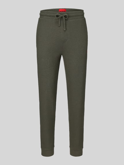 Produktfoto, olijfgroene regular fit broek met geribdele boorden en trekkoord, katoenmix, Regular Fit Sweathose aus Baumwoll-Mix model 'Austin' van HUGO, Heren Sweathose