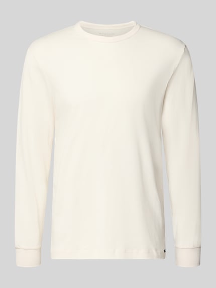 Produktfoto, Regular Fit Langarmshirt aus reiner Baumwolle von Tom Tailor in Unifarbe Creme, feine Jersey-Textur, Rundhalsausschnitt, Label Patch