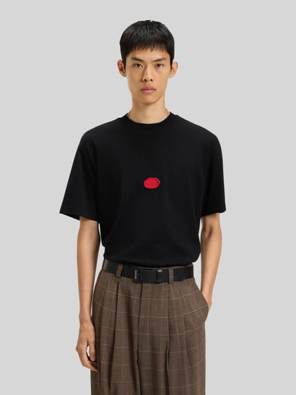 HUGO T-shirt o kroju relaxed fit z bawełnianego dżerseju model ‘DIVIS’ Czarny 4