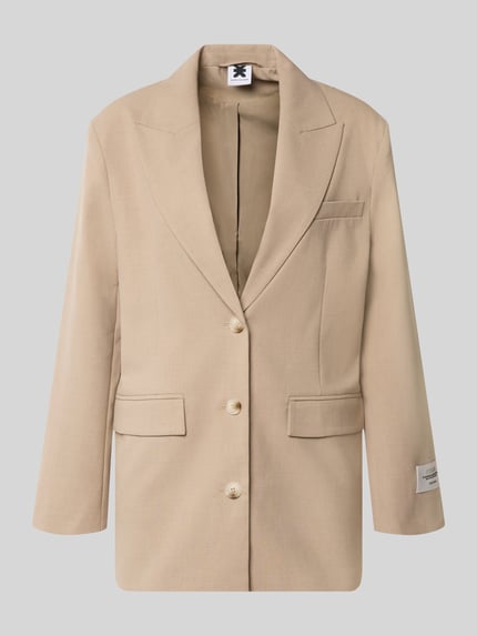 Oversized lange blazer met labelpatch rug Shop The Look MANNEQUINE