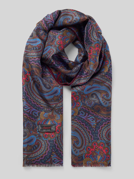 Produktfoto, Wollschal aus reiner Wolle mit Rückseite aus reiner Seide von Ascot mit Paisleymuster in Blau, Rot und Braun, ausgefranste Abschlüsse, Label-Applikation, Breite 33 cm, Länge 158 cm.