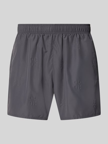 Produktfoto, Regular Fit Badeshorts mit Label-Prägung Modell 'TONAL' von HUGO in Grau, Optik: Unifarben, elastischer Bund, seitliche Eingrifftaschen.