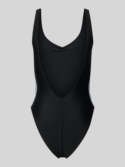 Frauenmodel trägt kostium kąpielowy Badeanzug mit Label Print Modell 'ADIC SWIMST 3S' von adidas Originals, efekt: jednolity kolor, ramiączka: wąskie ramiączka, fiszbina, detal miseczki: niewyściełane, aplikacja: nadruk z logo, dekolt: głęboki dekolt w serek, dekolt na plecach: głęboki dekolt w łódkę, czarny, gładka tekstura, Ganzkörperansicht Rückansicht