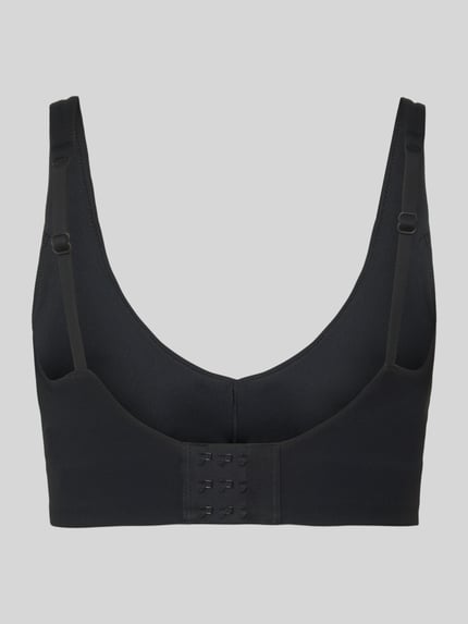 Produktfoto, czarny stanik Bustier mit Label-Print Modell 'PURELUXE LONGLINE' od Fabletics, elastyczna mieszanka materiałów, krój dopasowany, zapięcie na haftkę z tyłu, nadruk z logo, typ low impact