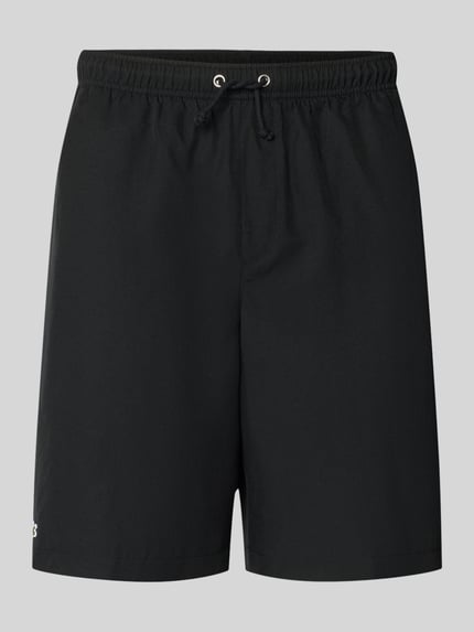 relaxed fit short met logopatch Shop The Look MANNEQUINE