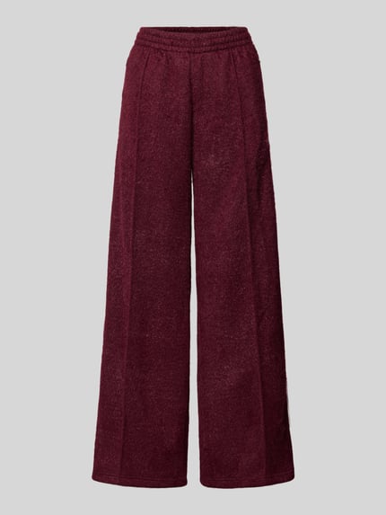 Produktfoto, Sweatpants mit elastischem Bund van adidas Originals in bordeauxrood met glittereffect, los model, labelstitching, ritszakken, binnenbeenlengte maat S 81 cm