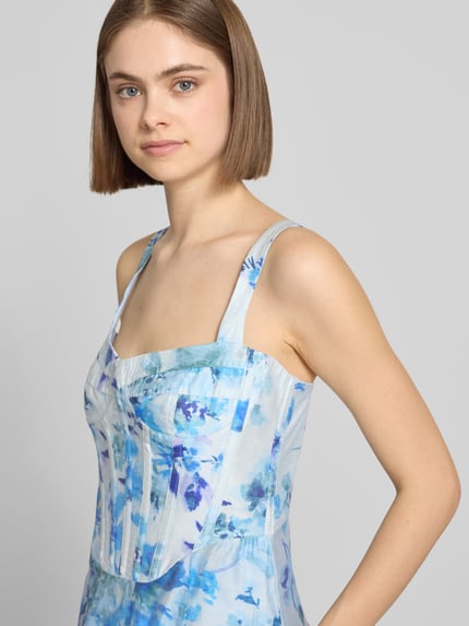Frauenmodel trägt Bardot Damen Midikleid aus Lyocell-Mix im floralen Allover-Print, Taillierte Passform, Ärmelloses-Design, Nahaufnahme Oberkörper.