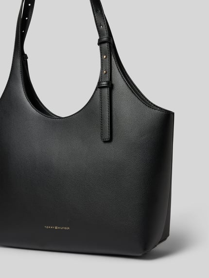 Productfoto, Shopper in genarbtem Leder-Optik van Tommy Hilfiger in zwart kunstleer, label-prägung, rits, hoofdvak, draaghengsels.
