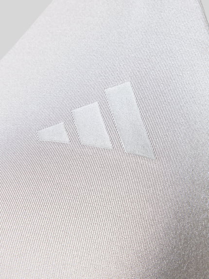 Produktfoto, Sport-BH mit Logo-Detail Modell 'OPT ESS LBRA' von adidas Sportswear, Optik: Unifarben mit feiner Stretch-Textur und appliziertem adidas-Logo