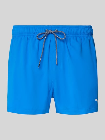Produktfoto, Badehose mit Seitentaschen und Klettverschlusstasche hinten von PUMA in Blau, elastischer Bund, Regular Fit, glatte Textur