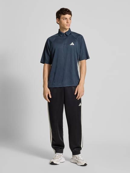 adidas Sportswear Koszulka polo o kroju regular fit z logo i zamkiem błyskawicznym Ciemnoniebieski 1