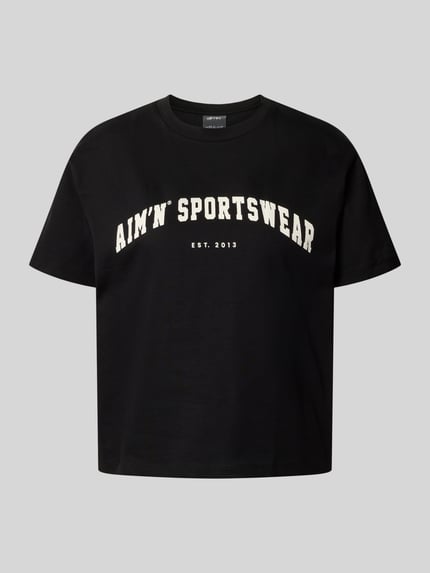 Produktfoto, Boxy Fit T-Shirt mit Label-Print von aim'n in Schwarz, reiner Baumwollstoff, Rundhalsausschnitt, Schriftzug-Print, Damen-Modell