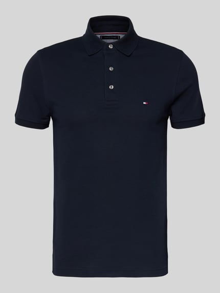 Produktfoto, Slim Fit Poloshirt mit Stretch-Anteil von Tommy Hilfiger aus Baumwoll-Elasthan-Mix, dunkelblau, kurze Knopfleiste, Logo-Stickerei.