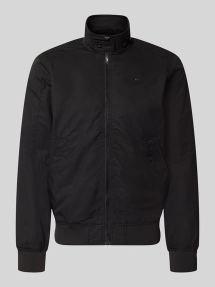 Produktfoto, schwarze Jacke mit Stehkragen und Reißverschluss von G-Star Raw aus Baumwoll-Mix, Regular Fit, glatte Textur, neutrale Ansicht.
