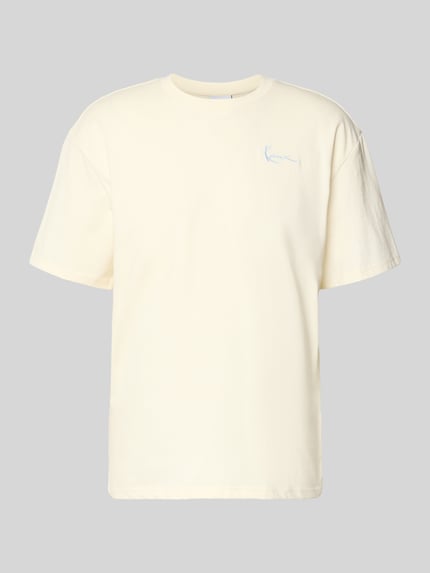 Produktfoto, Oversized T-Shirt mit rückseitigem Print von KARL KANI in Creme, Rundhalsausschnitt, reine Baumwolle, glatte Textur, Label-Stitching