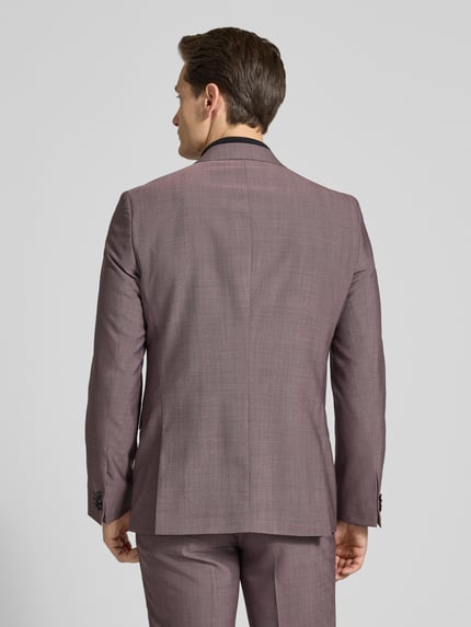 Männermodel trägt Extra Slim Fit Anzugsakko aus Schurwoll-Mix Modell 'ARTI253X' von HUGO, look effen, ganzlichaanzicht rugaanzicht.