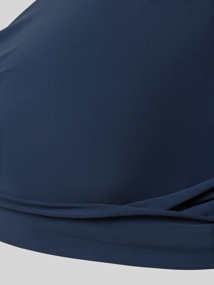 Produktfoto, Bikini-Oberteil mit Knotendetail Modell 'SOLID' von Barts, granatowy kolor, mieszanka materiałów z dodatkiem streczu, dopasowany krój, dekolt w serek, tekstura gładka
