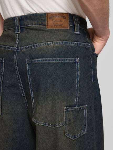 Karl Kani Relaxed baggy fit jeans in destroyed-look, model 'Distress' Jeansblauw - 3