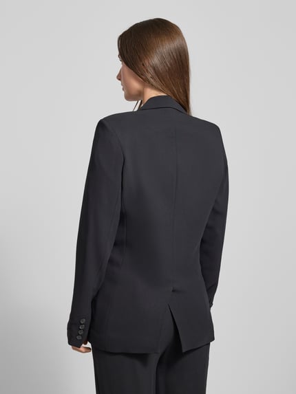 Vrouwenmodel draagt Blazer met Reverskraag Modell 'Inga' van GUIDO MARIA KRETSCHMER WOMAN, zwart, regular fit, rugaanzicht.