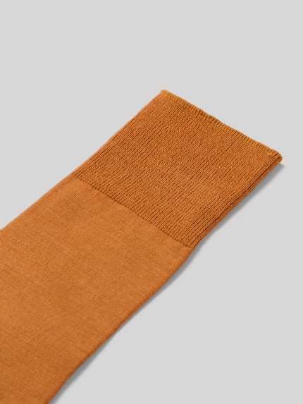 Produktfoto, Socken aus elastischem Schurwolle-Mix mit Baumwoll-Anteil von FALKE, Modell 'AIRPORT', prążkowany ściągacz, Z napisem z logo, mieszanka żywej wełny i bawełny, pomarańczowy kolor, gładka tekstura