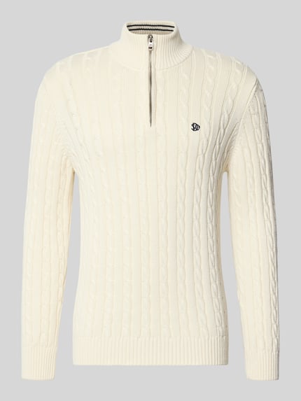 Produktfoto, Regular Fit Strickpullover aus reiner Baumwolle mit Zopfmuster von Superdry, Modell PREPPY, cremefarben, grob gestrickt