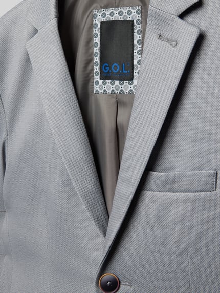 Produktfoto, hellgrauer Blazer mit Reverskragen von G.O.L., feine Struktur, Knopfverschluss, Brust- und Pattentaschen, Material-Mix mit Viskose-Anteil