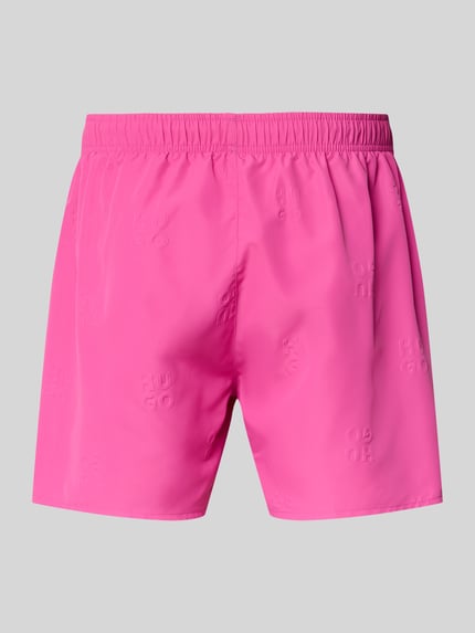 Produktfoto, Regular Fit Badeshorts mit Label-Prägung Modell 'TONAL' von HUGO, jednokolorowy różowy, krój regular fit, wytłaczane logo, elastyczny pas, wpuszczane kieszenie