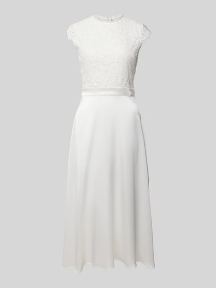 Produktfoto, Brautkleid in Midilänge Modell 'Lilia' von GUIDO MARIA KRETSCHMER WOMAN, góra z koronki, spódnica z satyny, krój taliowany, długość midi, stójka z bodiurą z koronki, bardzo krótkie rękawy, pasek w talii, wszyty zamek błyskawiczny z tyłu, długość tyłu w rozmiarze 36: 125 cm, szerokość klatki piersiowej w rozmiarze 36: 33 cm, długość rękawów w rozmiarze 36: 7 cm