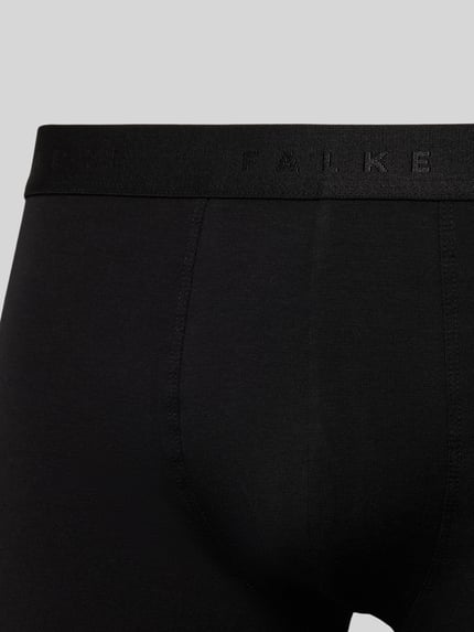 Produktfoto, zwarte Trunks met elastische band met logo, katoenmix met stretch, nauwsluitend model, Model 'Daily Comfort' van FALKE